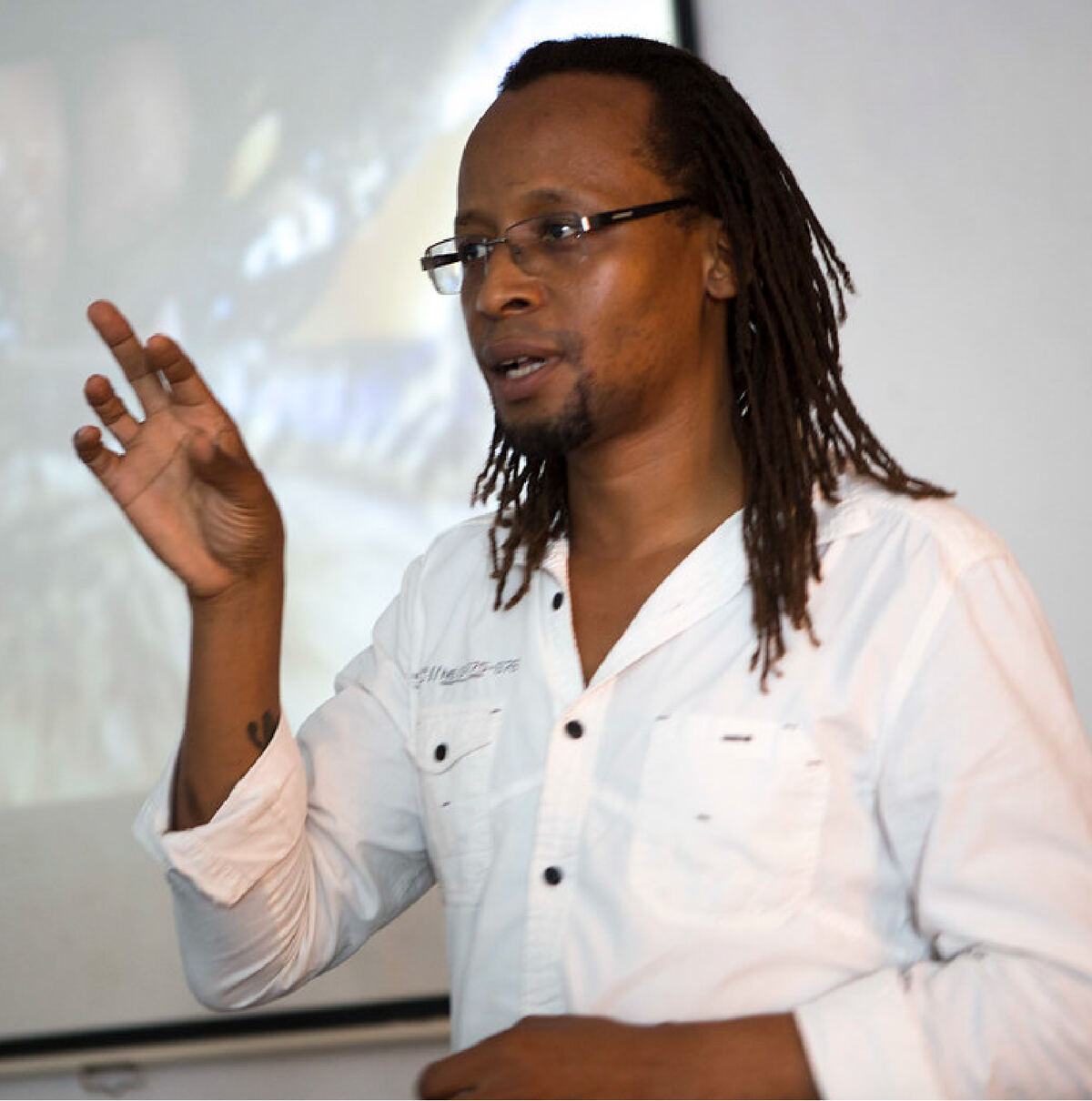 Frederick Mbuya presenting